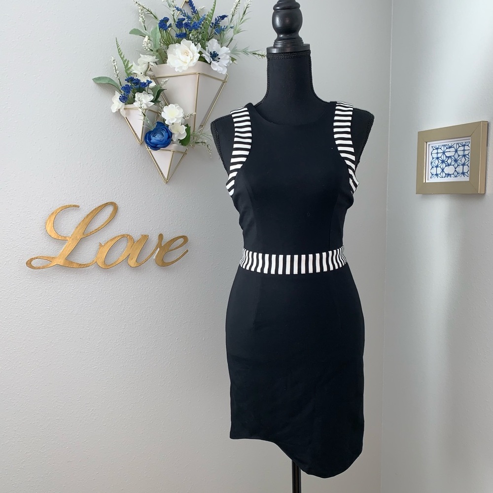 Asymmetrical black dress.  New